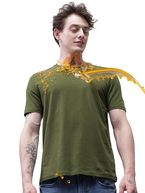 Person wearing a green t-shirt with yellow decorative elements on a white background