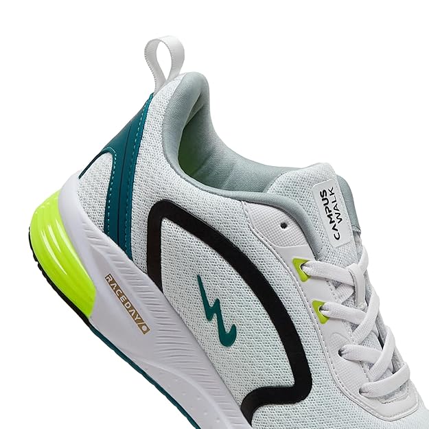 White running shoe with green sole and black accents on a white background