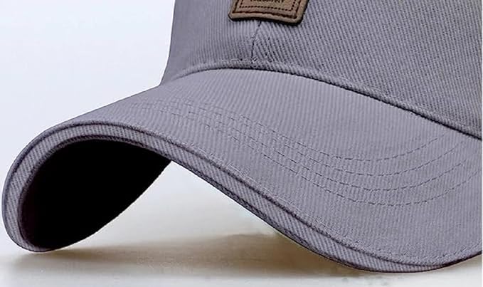 Gray baseball cap with a brown patch on a light gray background