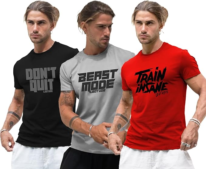Three men wearing motivational t-shirts with different phrases.