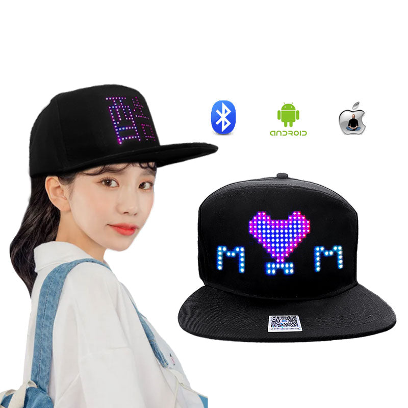 Black LED cap with text and heart symbol worn by a person, with additional caps shown below on a white background.