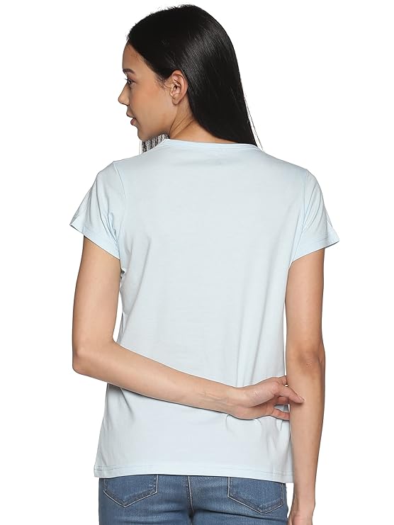 Woman wearing a light blue t-shirt on a white background