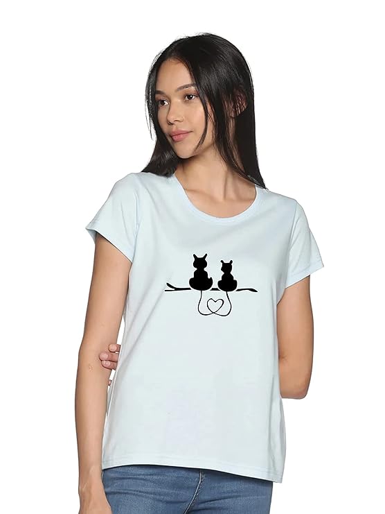 Woman wearing a light blue t-shirt with a black cat design on a white background